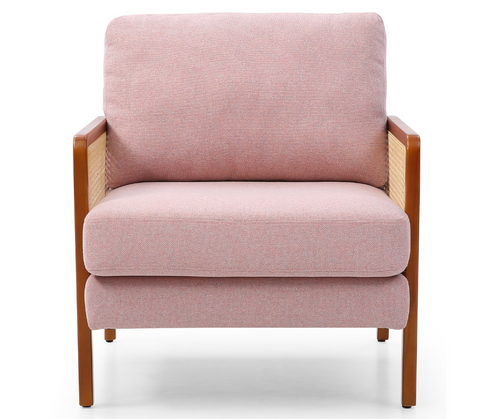 Modern pink upholstered armchair with wooden frame and woven rattan side panels