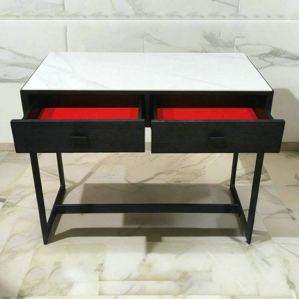 Black console table with drawers