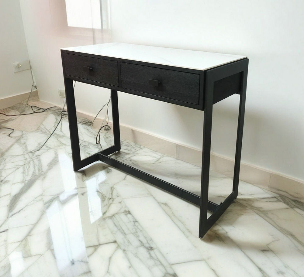 Black console table with drawers