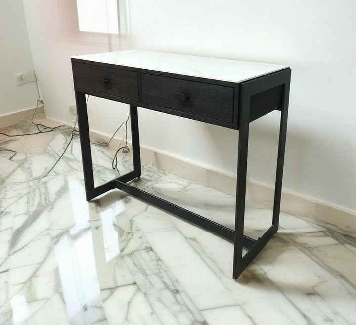 Black console table with drawers