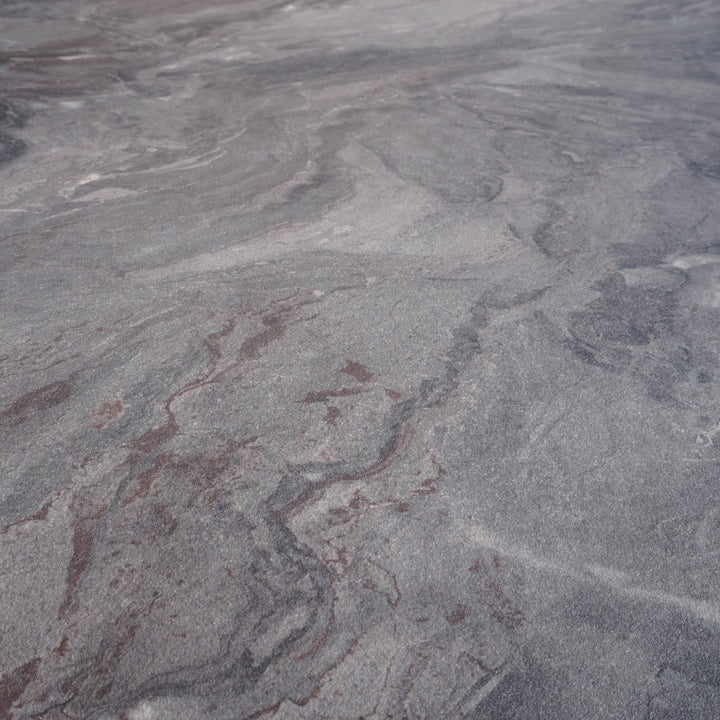Grey marble-effect surface with natural veining for dining tables and furniture