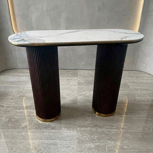 Modern marble-top console table with fluted dark wood legs and gold accents, ideal for entryway or living room decor.