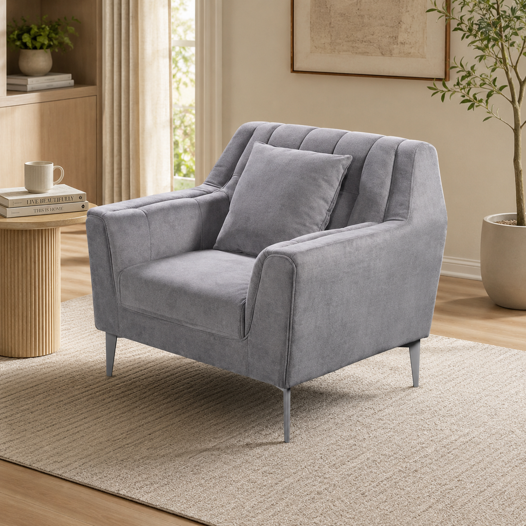 Gray velvet armchair with matching pillow, modern living room furniture