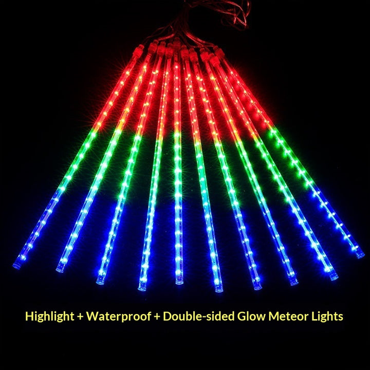 LED meteor shower lights in red, green, and blue glowing on a black background