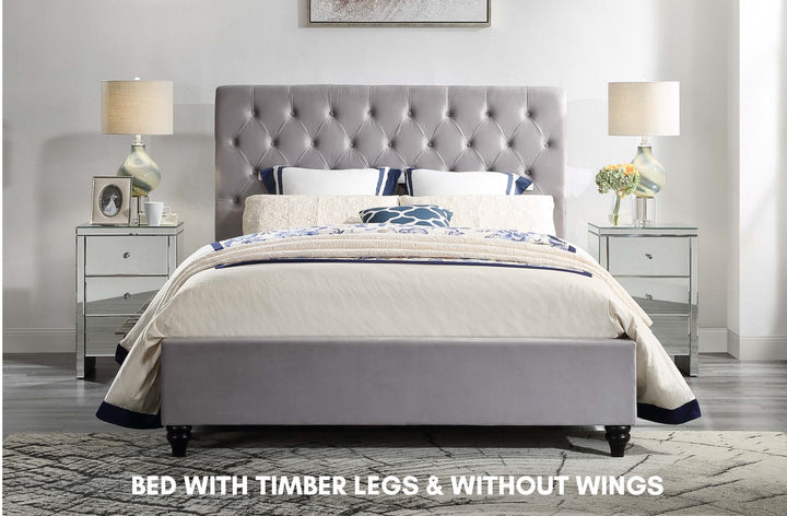 Grey upholstered bed with timber legs, no wings, mirrored bedside tables, bedroom setting