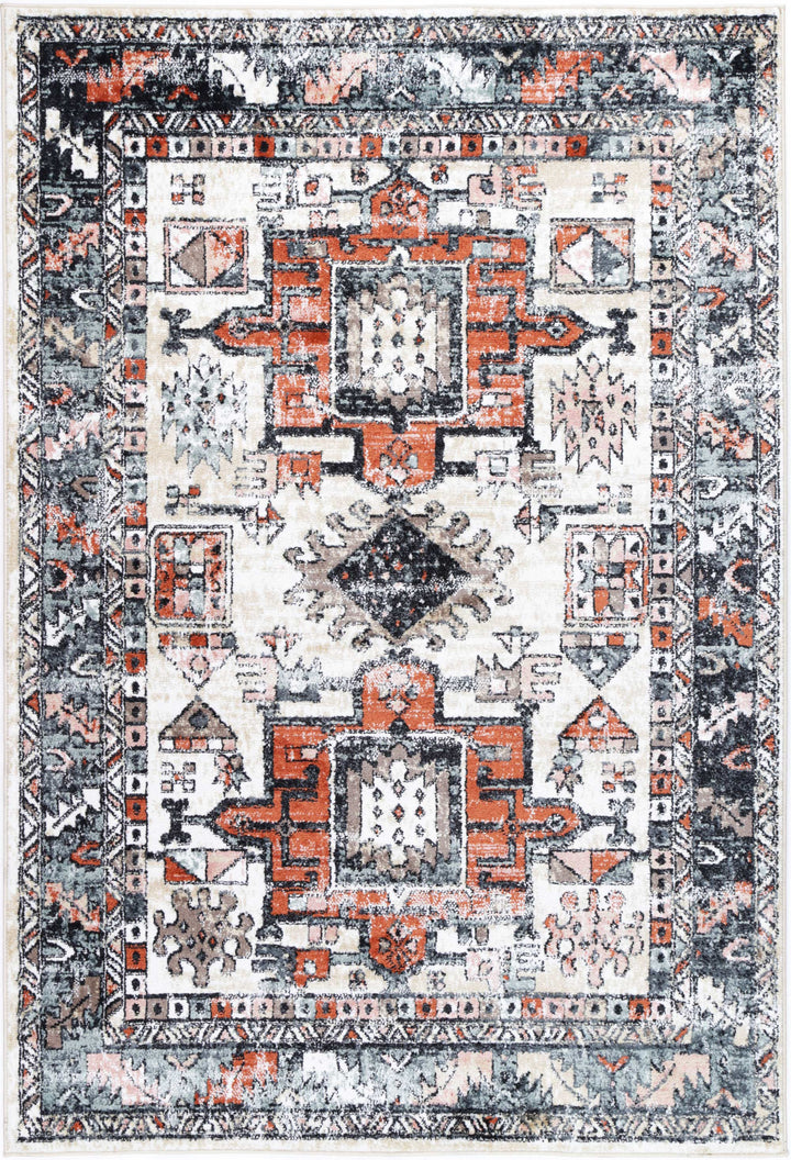 Bohemian style area rug with geometric patterns in orange, cream, and grey tones