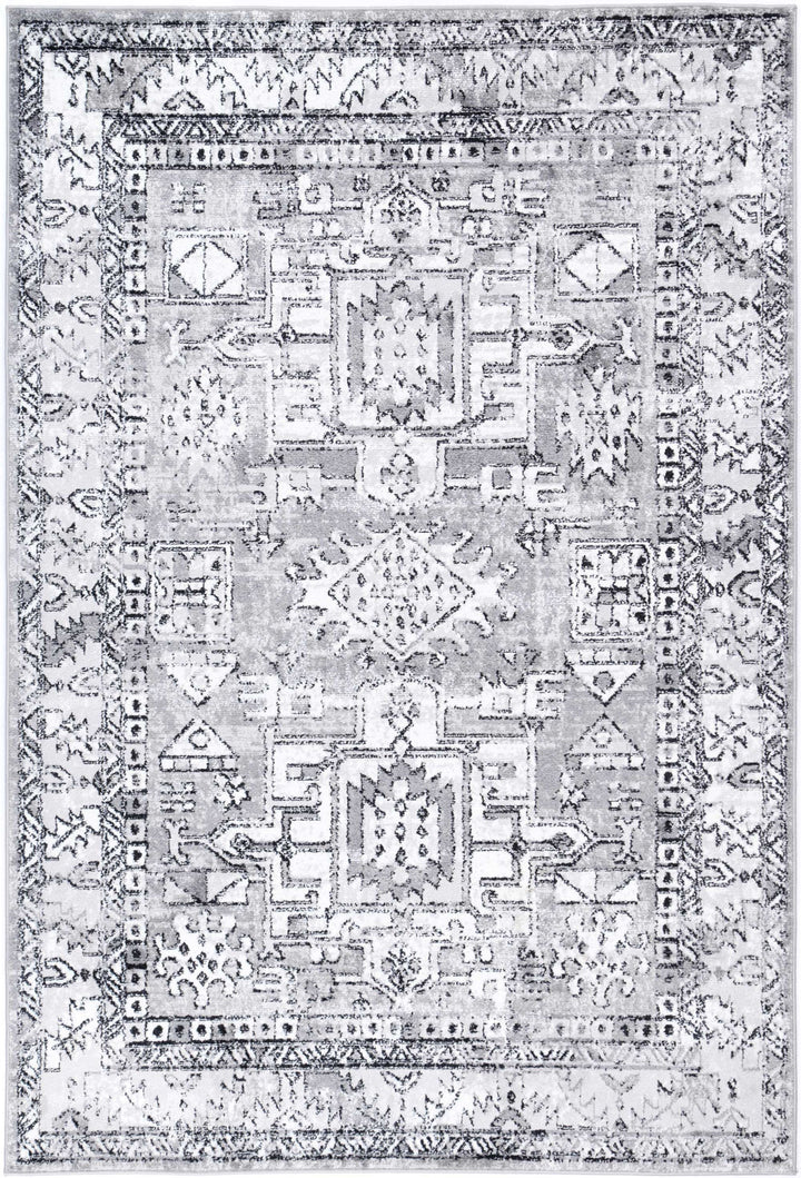 Grey area rug with distressed vintage geometric pattern and ornate border