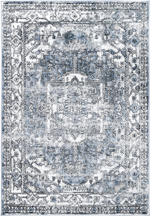 Blue and white area rug with distressed vintage floral pattern and intricate border
