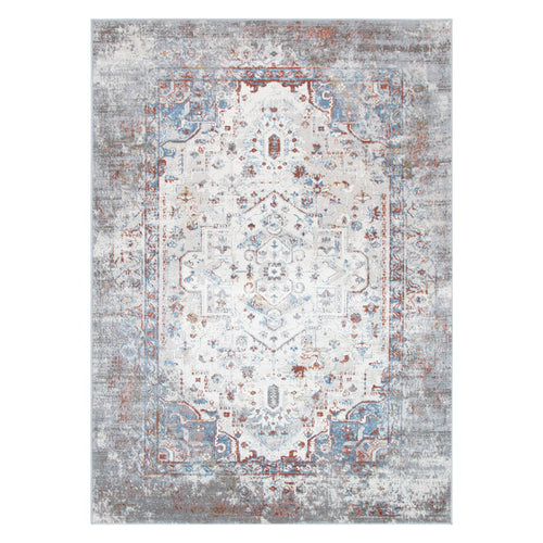 Vintage-style area rug with distressed blue, grey, and rust medallion pattern