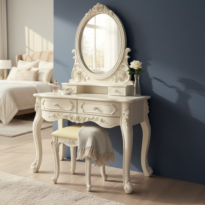 French style white dressing table with ornate mirror and stool in elegant bedroom setting