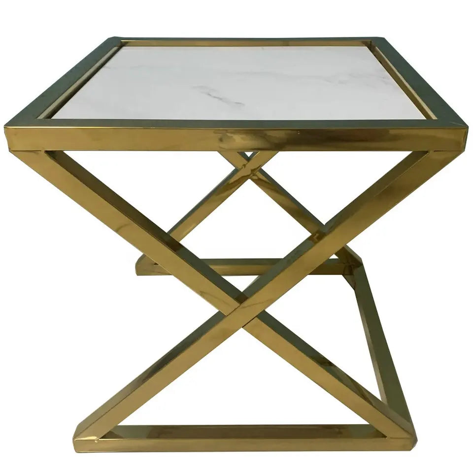 Modern gold metal side table with a white marble top and geometric base