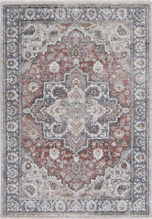 Traditional area rug with intricate floral patterns in red, blue, and cream tones