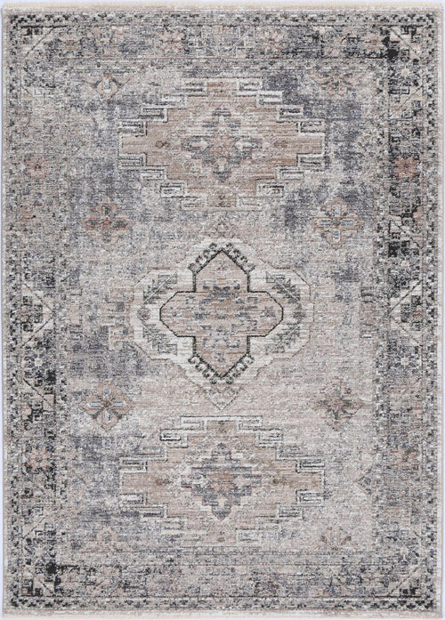 Vintage-style area rug with geometric central medallion and muted beige, grey, and taupe tones