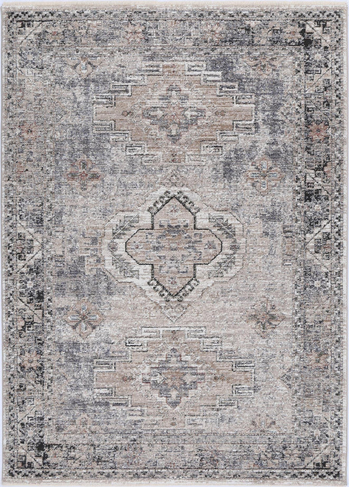 Vintage-style area rug with geometric central medallion and muted beige, grey, and taupe tones
