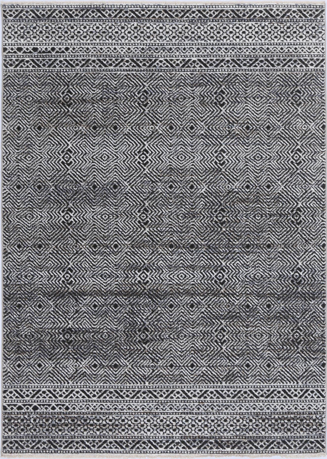 Black and white geometric area rug with diamond and tribal patterns