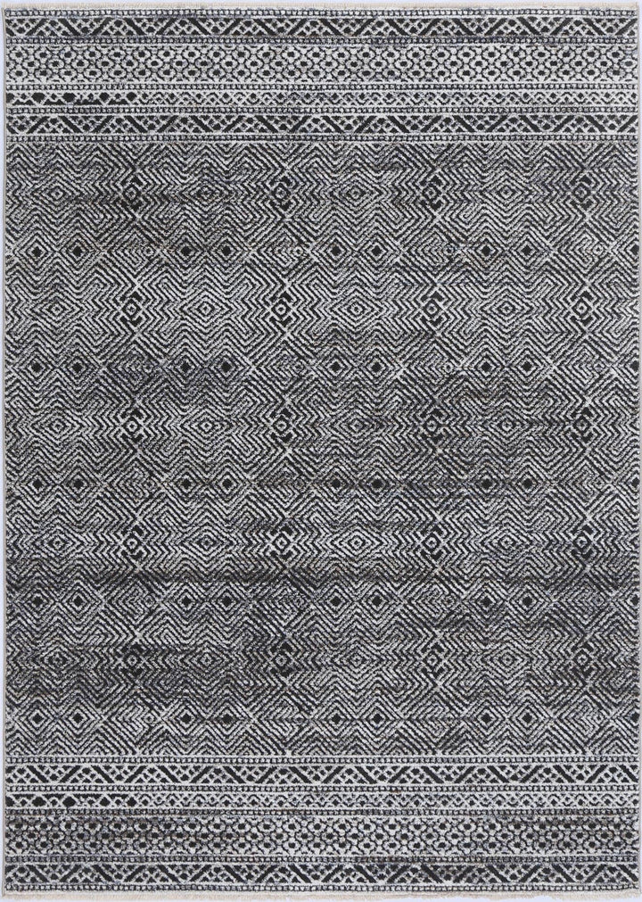Black and white geometric area rug with diamond and tribal patterns