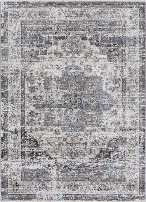 Vintage style area rug with distressed blue, gray, and beige ornate patterns