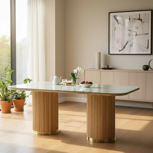 Modern glass top dining table with wooden pedestal legs in a bright living room
