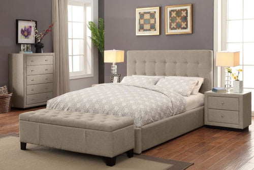 Modern beige upholstered bed with tufted headboard, matching bench and nightstands in a stylish bedroom