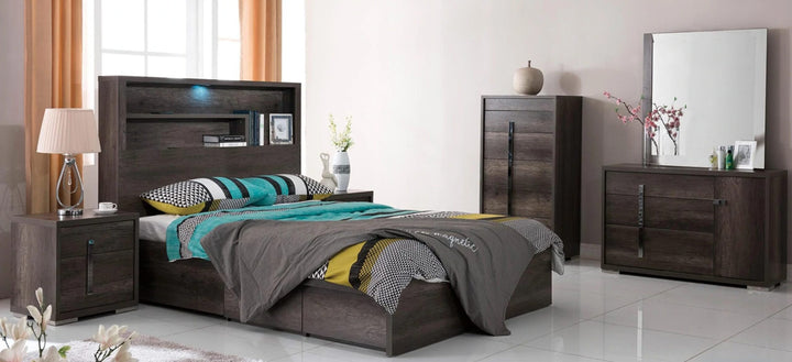 Modern dark wood bedroom set with bed, nightstand, dresser, and wardrobe in a bright room