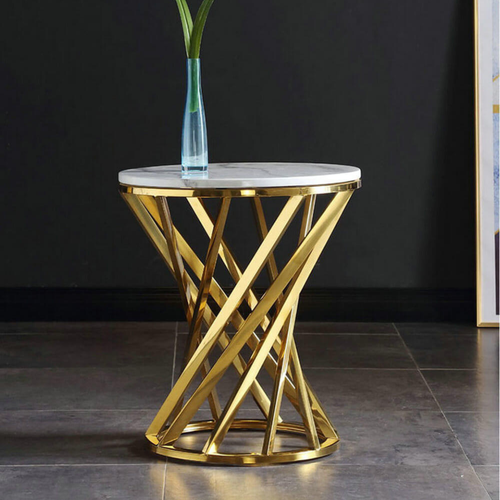 Modern round side table with gold geometric metal base and white marble top, decorative vase
