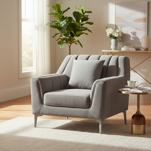 Modern gray armchair with tufted back, cushion, and metal legs in cozy living room setting