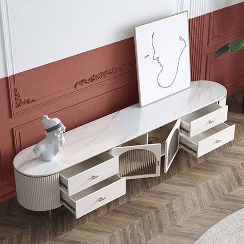 Modern white marble TV unit with drawers and cabinets, styled in living room with art and decor