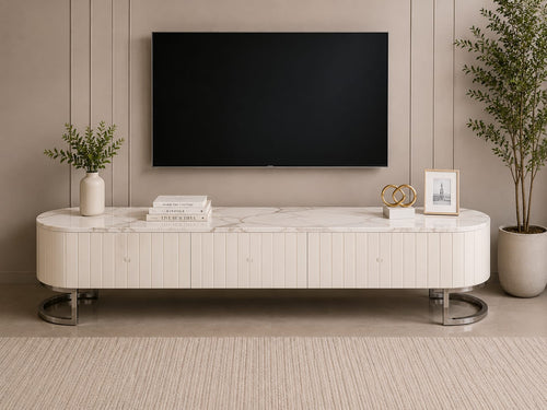 Modern white marble-top TV unit with sleek legs, styled with decor in a contemporary living room