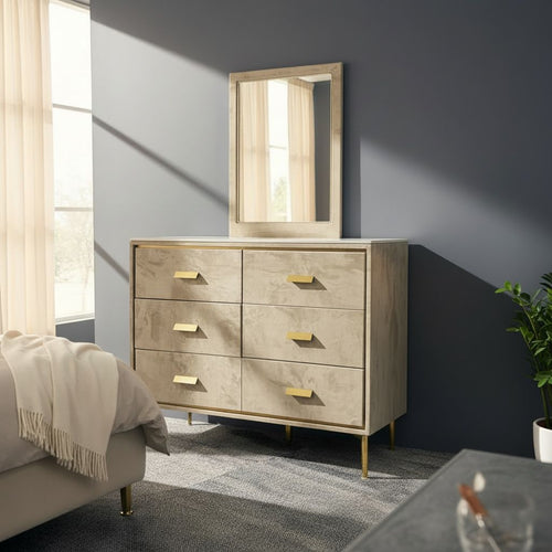 Modern beige dresser with gold handles and matching mirror in a sunlit bedroom