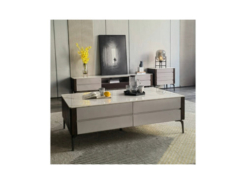 Modern white marble-top coffee table with sleek drawers in contemporary living room setting