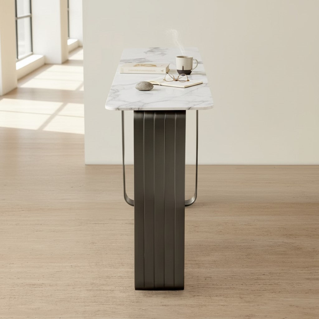 Modern marble top coffee table with metal base in a bright minimal living room