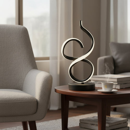 Modern sculptural LED table lamp on wooden coffee table in cozy living room setting