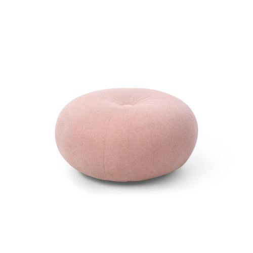Round pink fabric ottoman pouf for living room or bedroom seating